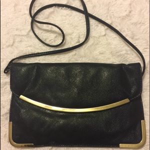Clutch bag with shoulder strap